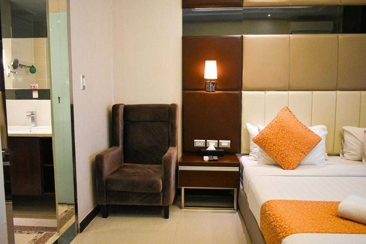 Mg Grand Hotel 奥隆阿波 外观 照片