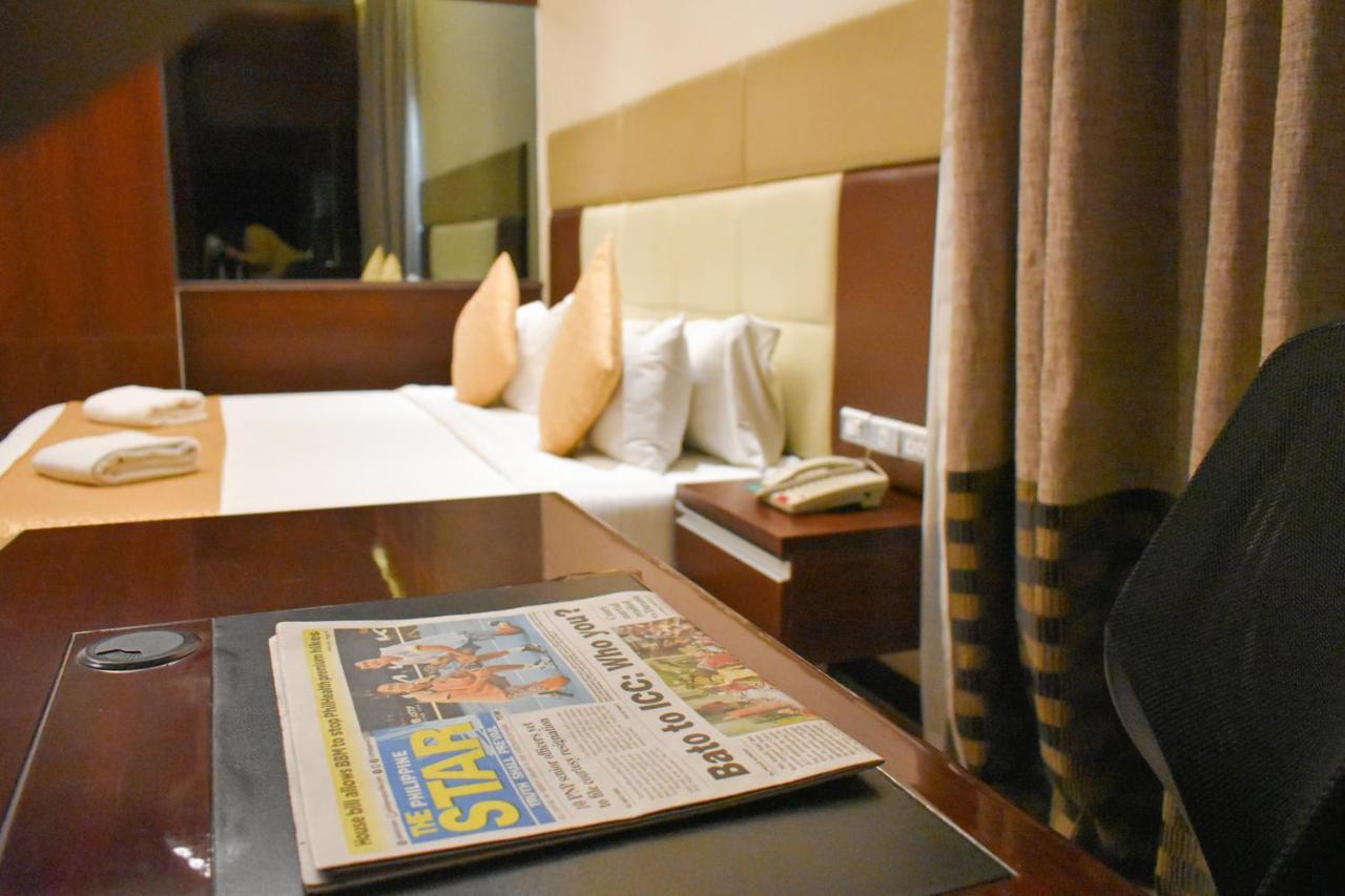 Mg Grand Hotel 奥隆阿波 外观 照片
